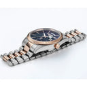 Roamer Primeline Daydate 42mm Men's Swiss Automatic Watch – Blue Dial, Rose Gold Hands, Stainless Steel Case, Sapphire Glass, 41-Hour Power Reserve