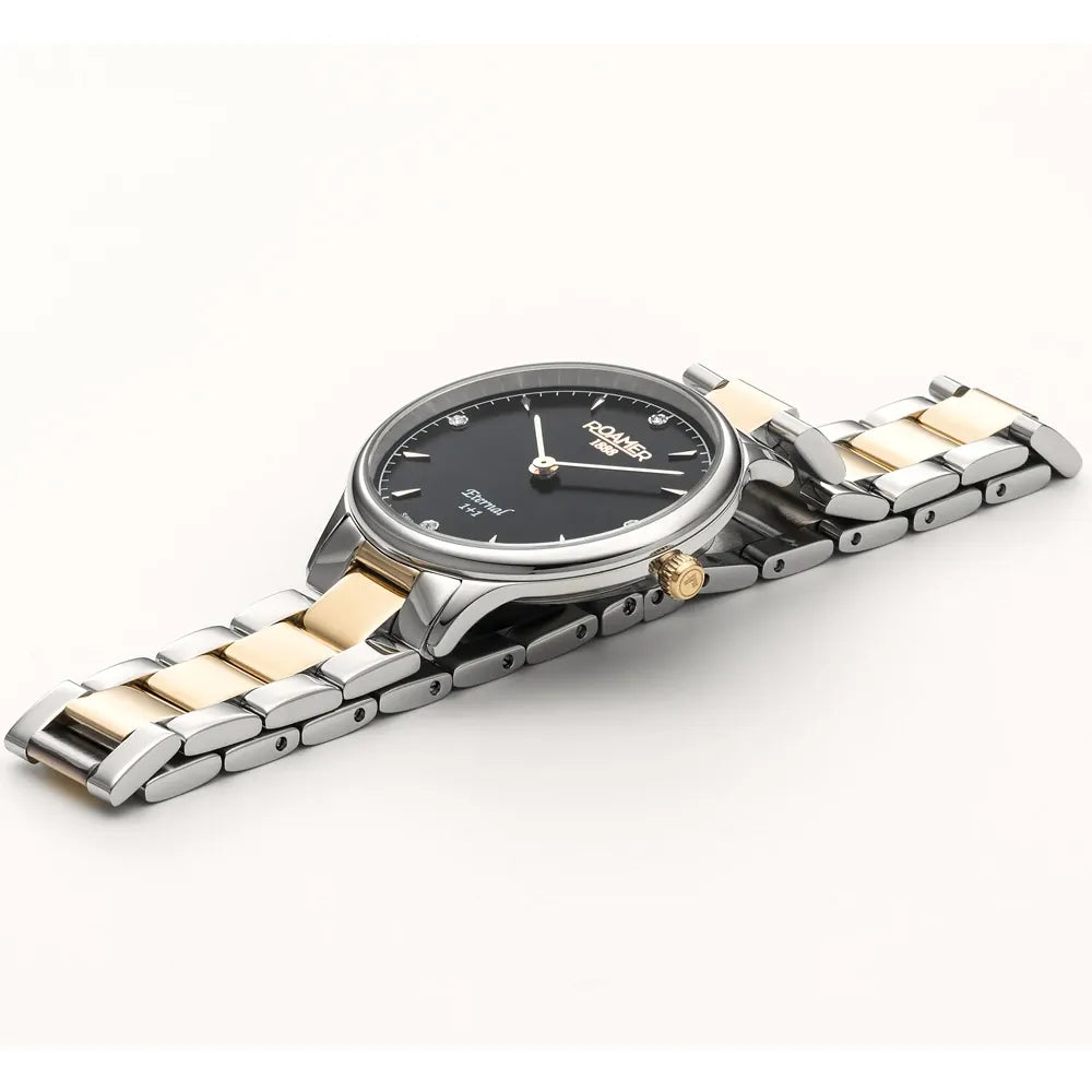 Roamer Eternal 30 mm Ladies Battery Watch – Swiss Made, Black Dial with Gold Hands, Bicolor Stainless Steel Link Bracelet, Anti-Reflective Sapphire Glass, 5 Bar Water Resistance