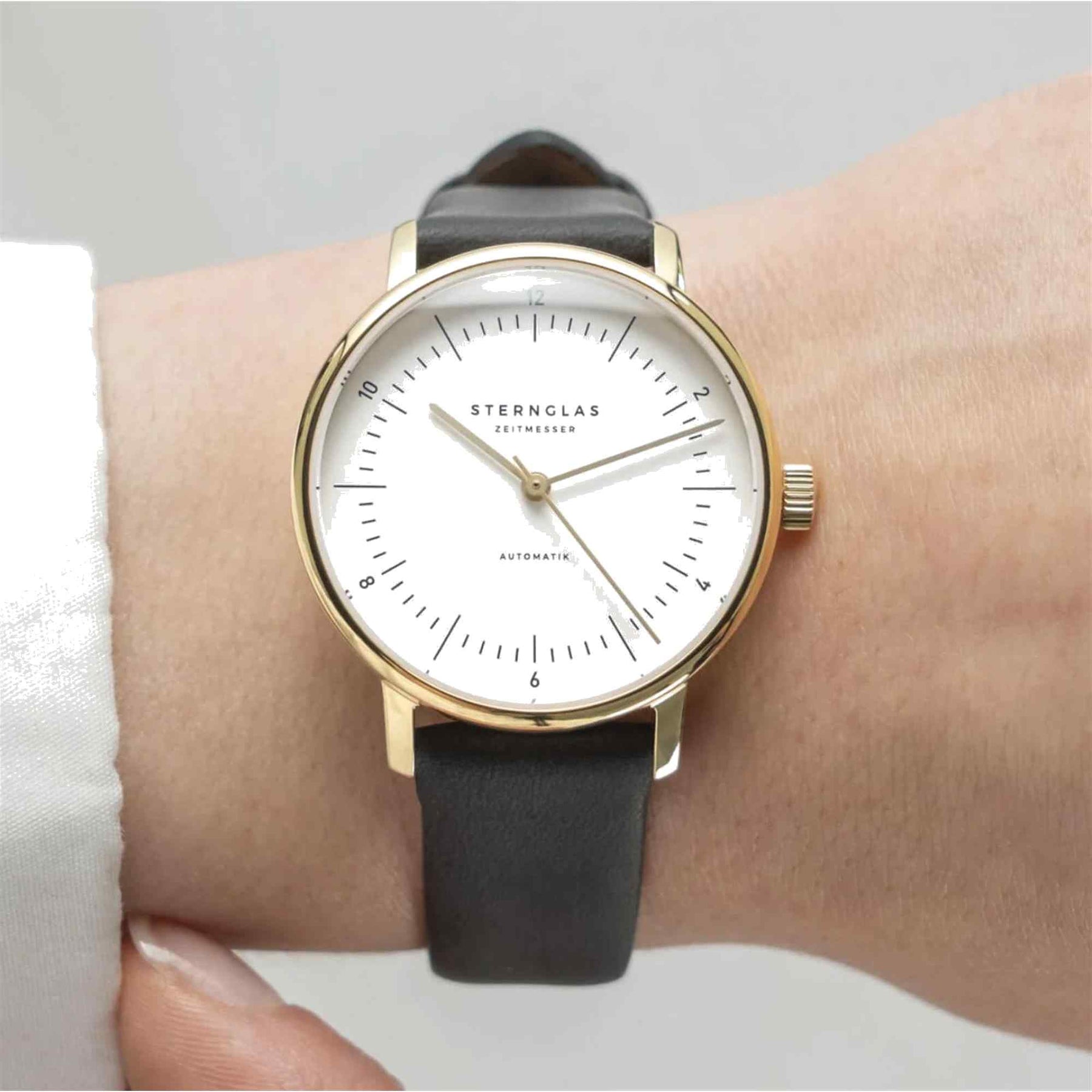 Sternglas NAOS XS 33mm Automatic Watch S02-ND02-KL08, White Dial, Sapphire Crystal, Gold Case, Black Leather Strap, 5 ATM Water Resistant